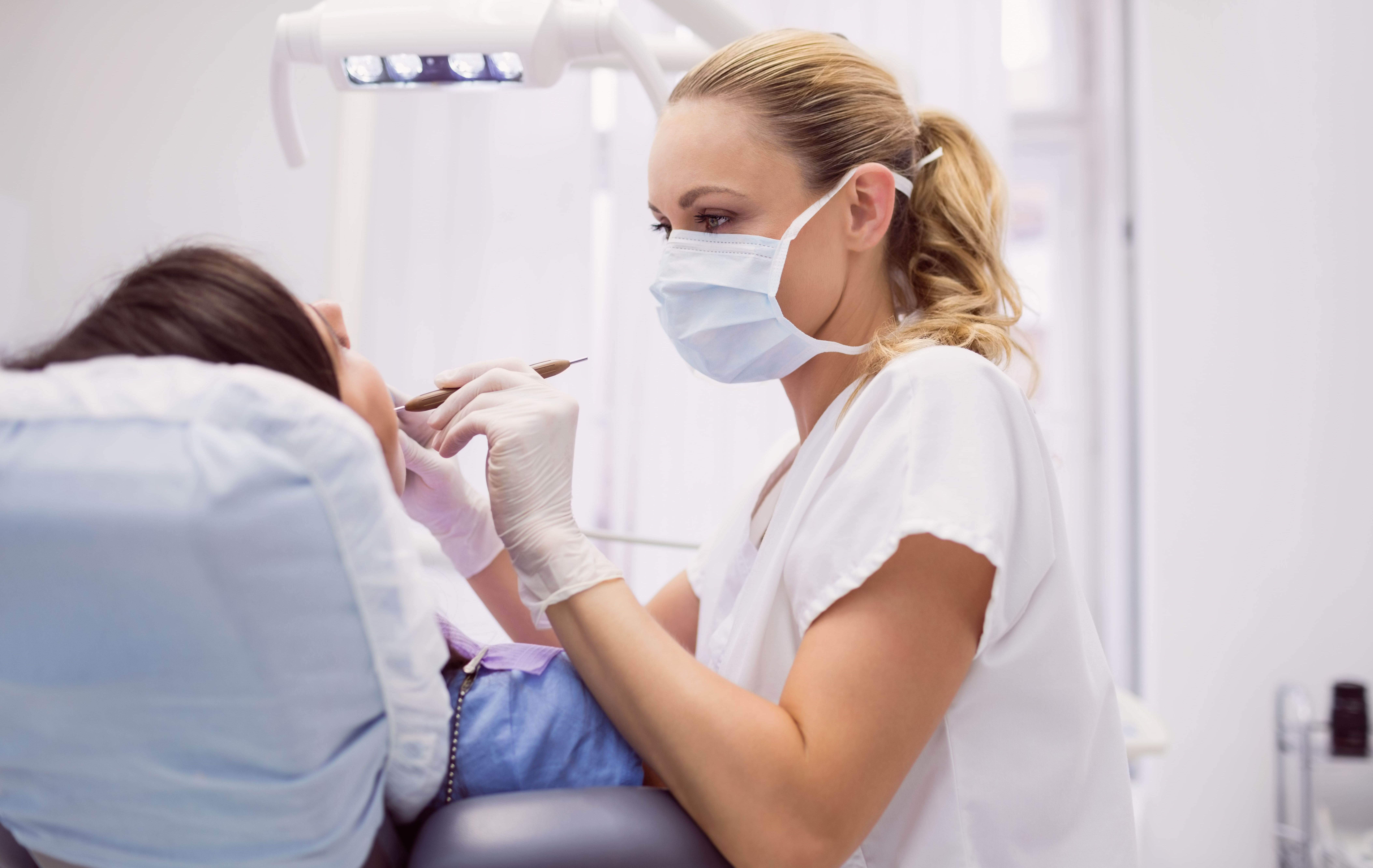 dentist-examining-female-patient (1) (1).jpg
